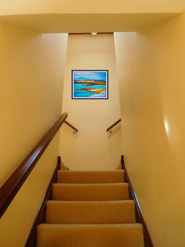 Isle of Skye artwork hanging above stairs